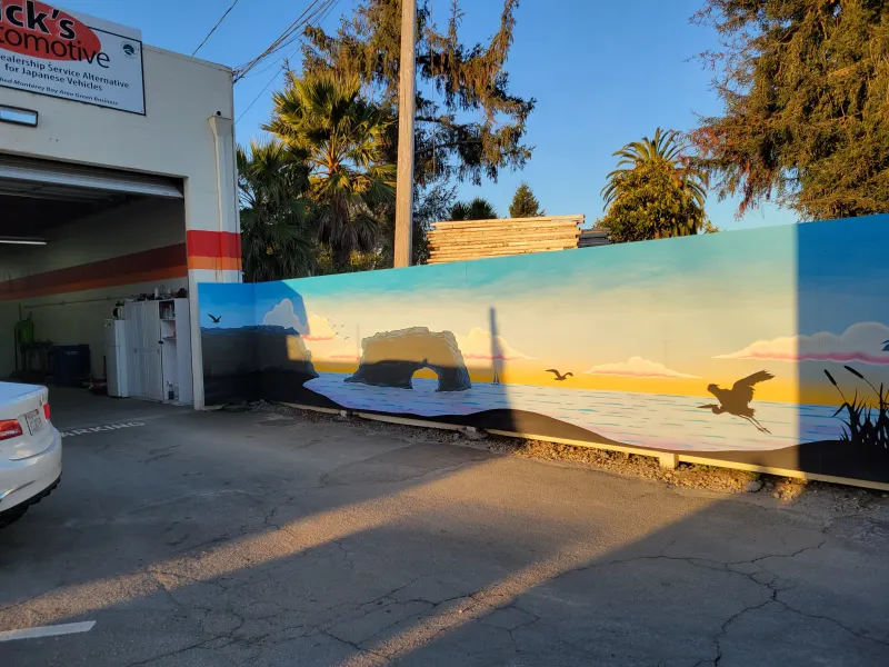 Beach mural along the shop’s parking lot